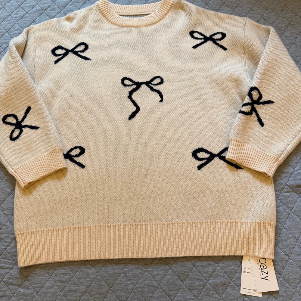 Dazy Cream Sweater with Black Bow Details